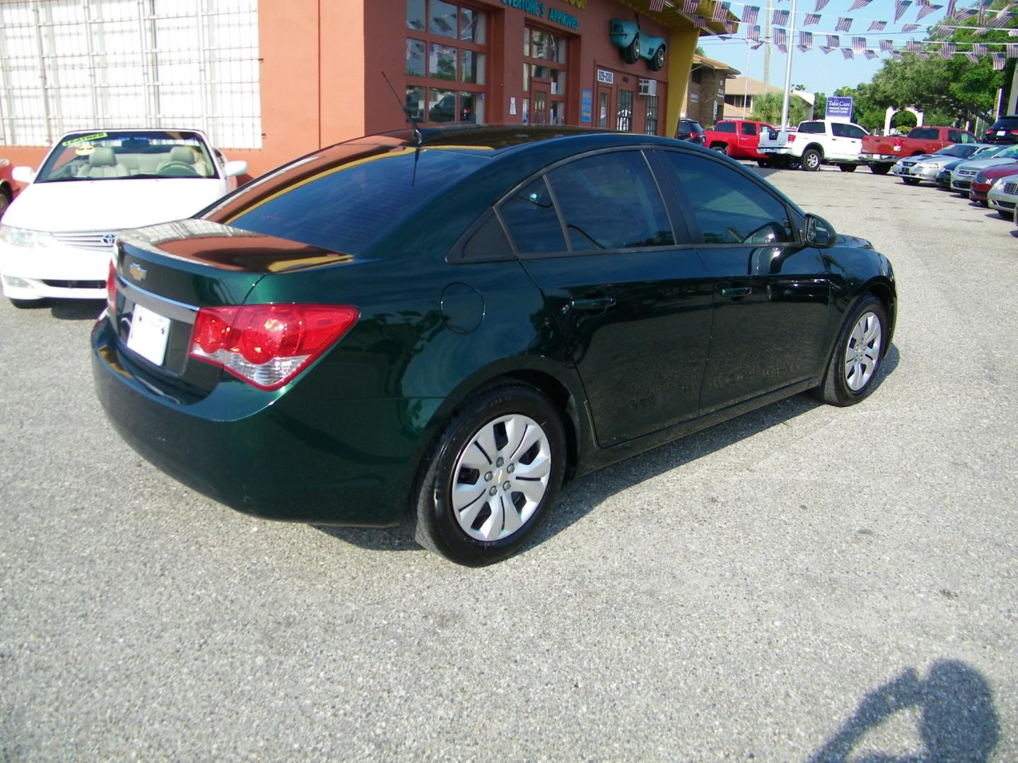 2014 GREEN /Beige Chevrolet Cruze LS (1G1PA5SH4E7) with an 1.8L L4 DOHC 16V FFV engine, 6-Speed Automatic transmission, located at 4000 Bee Ridge Road, Sarasota, FL, 34233, (941) 926-0300, 27.298664, -82.489151 - Photo#5